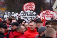 1763356540327-jelang-laga-piala-dunia-fans-sepakbola-jerman-gelar-aksi-protes-1763292487708_43