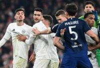 1769317475529-arsenal-vs-man-united-harry-maguire-kai-havertz_43